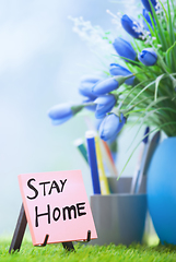 Image showing Adhesive note with Stay Home text at the green office