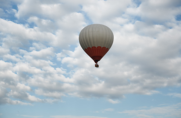 Image showing One hot air balloon flying in the sky