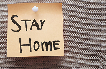 Image showing Adhesive note with Stay Home text on a bulletin board