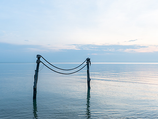 Image showing Mooring stakes at dawn in Thailand