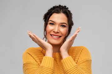 Image showing happy smiling young woman with pierced nose