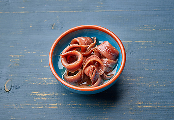 Image showing bowl of canned anchovy fillets