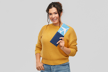 Image showing happy young woman with air ticket and passport