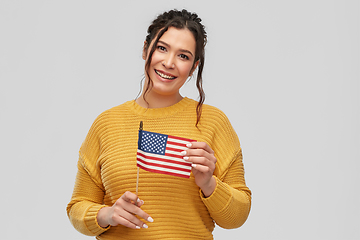 Image showing happy woman with flag of united states of america