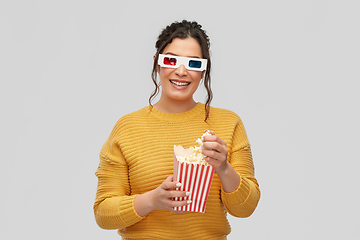 Image showing happy woman in 3d movie glasses with popcorn