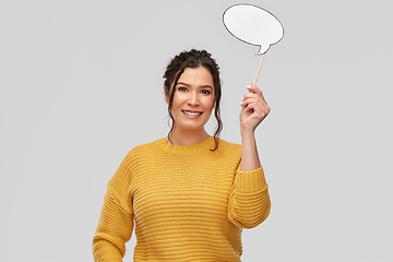 Image showing smiling young woman holding speech bubble