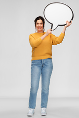 Image showing smiling young woman holding big speech bubble