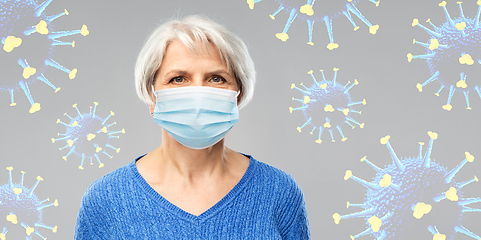 Image showing senior woman in protective medical mask