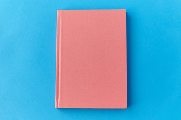 Image showing notebook or diary on blue background