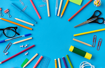 Image showing stationery or school supplies on blue background