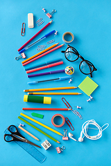 Image showing stationery or school supplies on blue background