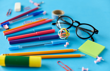 Image showing stationery or school supplies on blue background