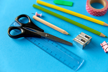 Image showing stationery or school supplies on blue background