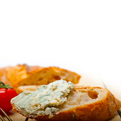 Image showing fresh blue cheese spread ove french baguette