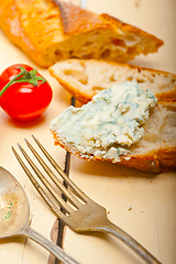 Image showing fresh blue cheese spread ove french baguette