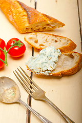 Image showing fresh blue cheese spread ove french baguette