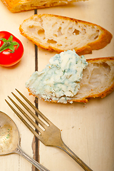 Image showing fresh blue cheese spread ove french baguette