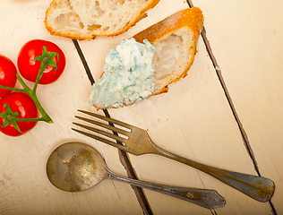 Image showing fresh blue cheese spread ove french baguette