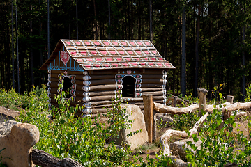 Image showing Huts like gingerbread house in forest