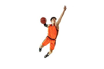 Image showing Young basketball player training isolated on white studio background