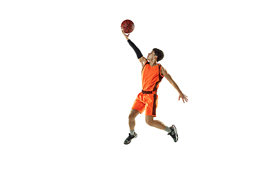 Image showing Young basketball player training isolated on white studio background