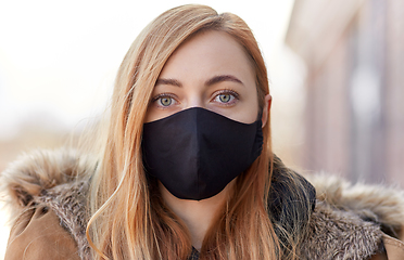 Image showing woman wearing protective reusable barrier mask