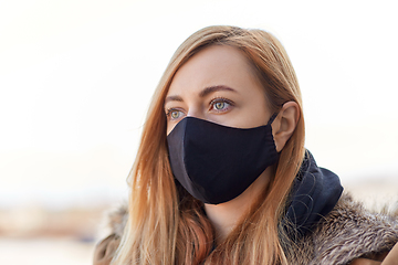 Image showing woman wearing protective reusable barrier mask