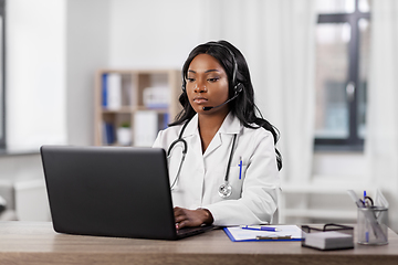 Image showing african doctor with headset and laptop at hospital
