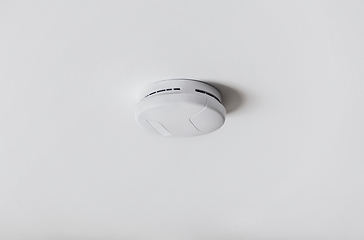 Image showing smoke alarm, sensor or detector on white ceiling