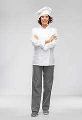 Image showing smiling female chef in toque
