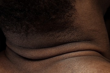 Image showing Texture of human skin. Close up of african-american male body