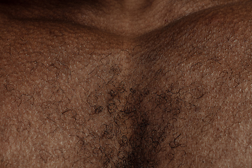 Image showing Texture of human skin. Close up of african-american male body