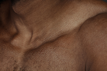 Image showing Texture of human skin. Close up of african-american male body