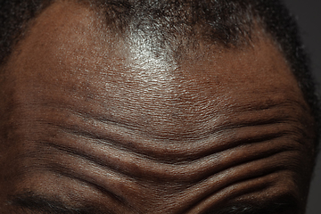 Image showing Texture of human skin. Close up of african-american male body