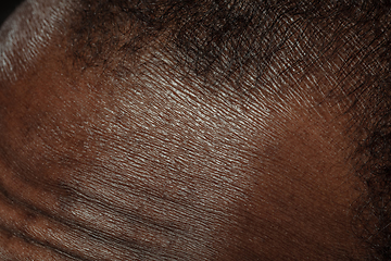 Image showing Texture of human skin. Close up of african-american male body