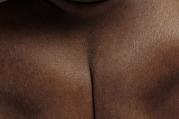 Image showing Texture of human skin. Close up of african-american male body