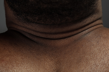 Image showing Texture of human skin. Close up of african-american male body