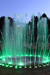 Image showing colored fountains in city park