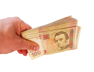 Image showing Ukrainian money of value 100 in the hand isolated