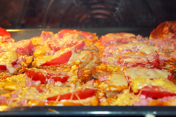 Image showing hot sandwiches cooking in the kitchen-range