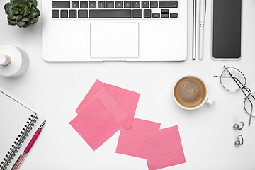 Image showing Flat lay, mock-up. Feminine home office workspace, copyspace