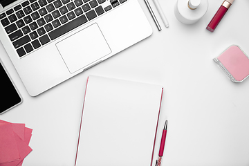 Image showing Flat lay, mock-up. Feminine home office workspace, copyspace