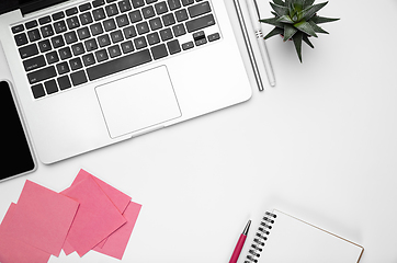 Image showing Flat lay, mock-up. Feminine home office workspace, copyspace