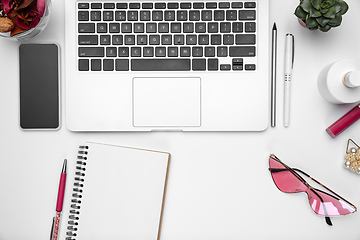 Image showing Flat lay, mock-up. Feminine home office workspace, copyspace