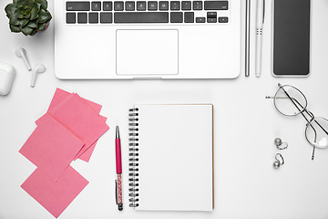 Image showing Flat lay, mock-up. Feminine home office workspace, copyspace