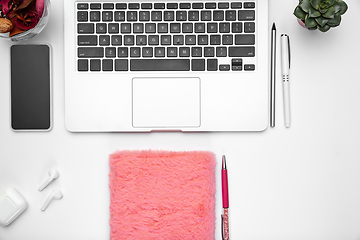 Image showing Flat lay, mock-up. Feminine home office workspace, copyspace