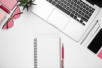 Image showing Flat lay, mock-up. Feminine home office workspace, copyspace