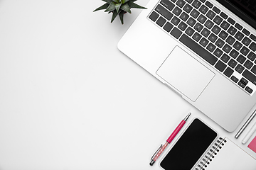 Image showing Flat lay, mock-up. Feminine home office workspace, copyspace