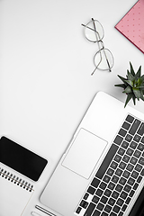 Image showing Flat lay, mock-up. Feminine home office workspace, copyspace