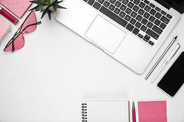 Image showing Flat lay, mock-up. Feminine home office workspace, copyspace